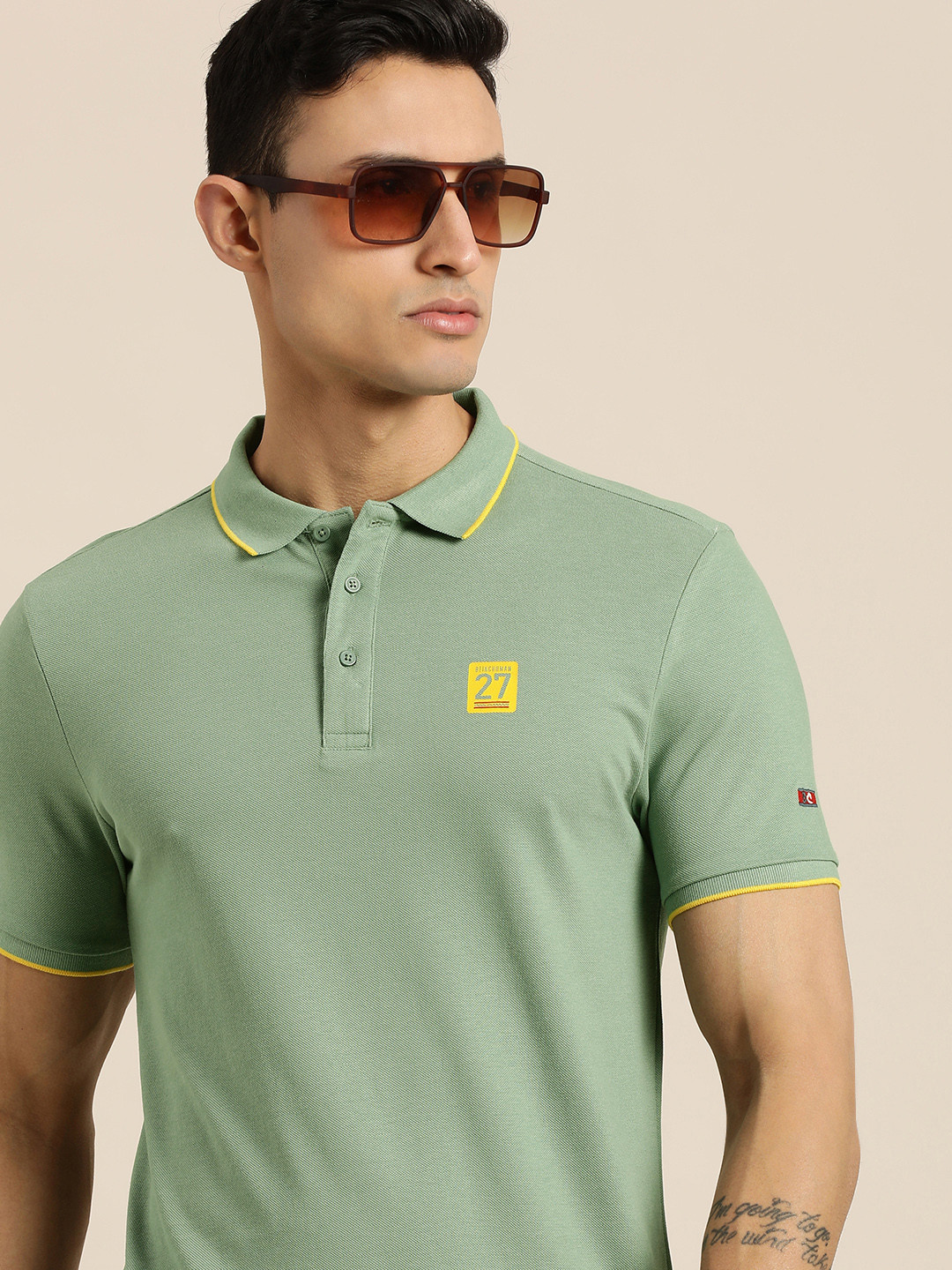 

Being Human Men Green Solid Polo Collar Pure Cotton Slim Fit T-shirt With Brand Logo Print
