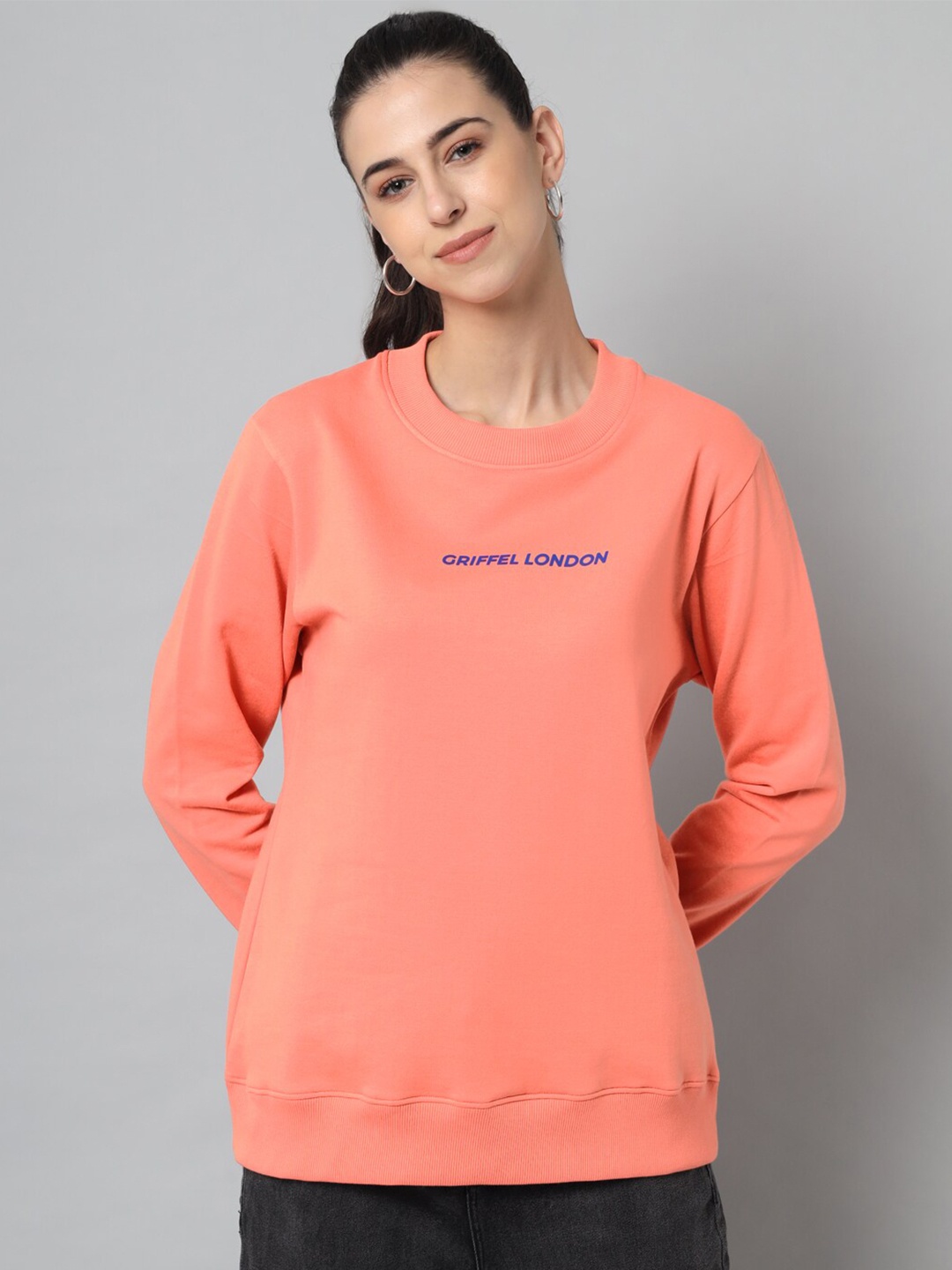 

GRIFFEL Women Peach-Coloured Solid Sweatshirt