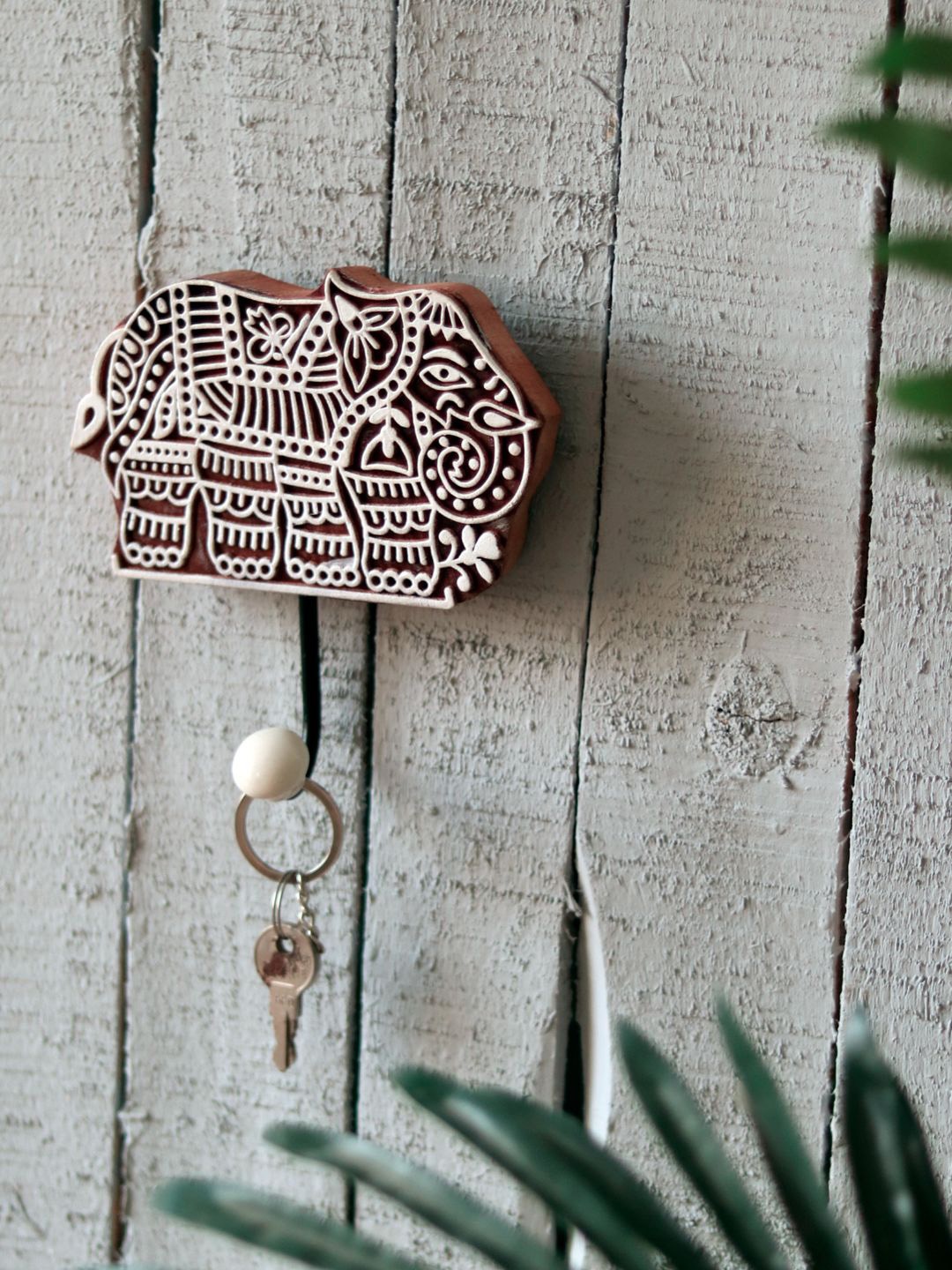 

Unravel India Brown Tusker Motif Wooden Hand Carver Key Holders