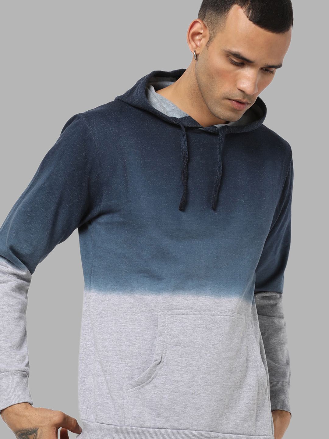 

Campus Sutra Men Blue Tie & Dye Hooded Sweatshirt