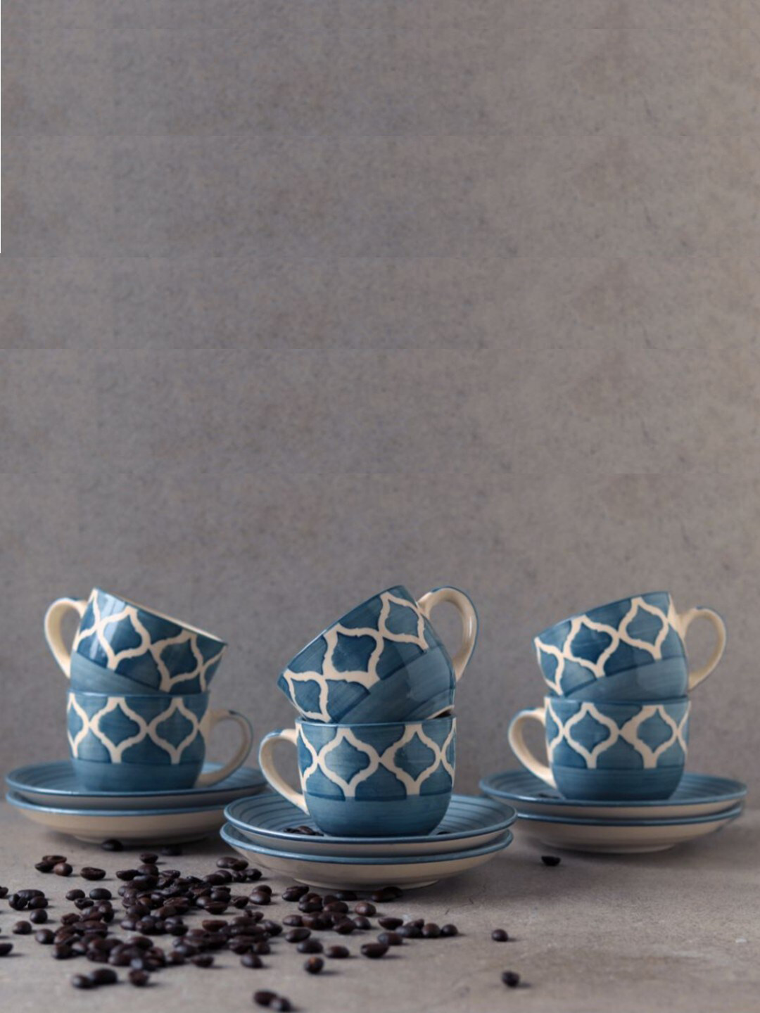 

Unravel India White & Blue Set of 6 Hand Painted Ceramic Matte Cups and Saucers 150 ml