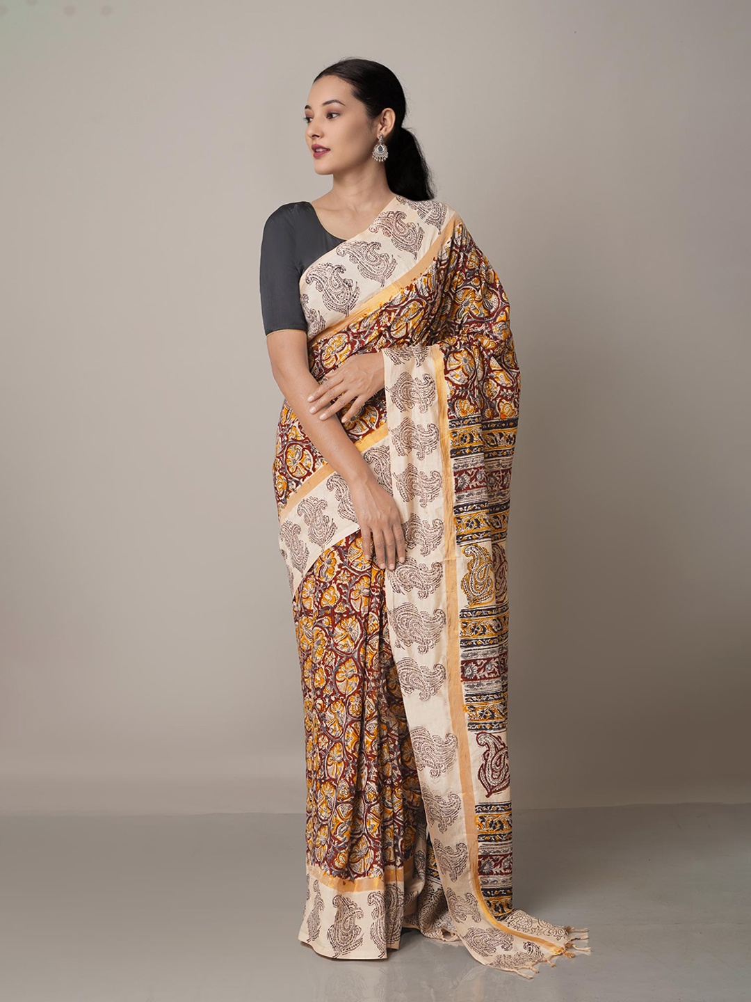 

Unnati Silks Maroon & Beige Kalamkari Pure Silk Block Print Saree