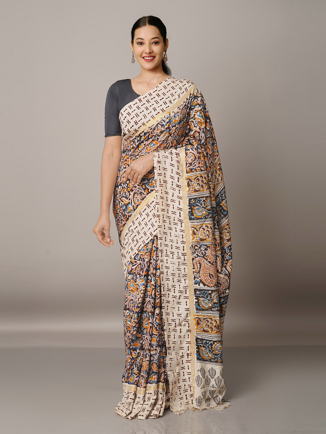

Unnati Silks Beige & Blue Kalamkari Pure Silk Block Print Saree