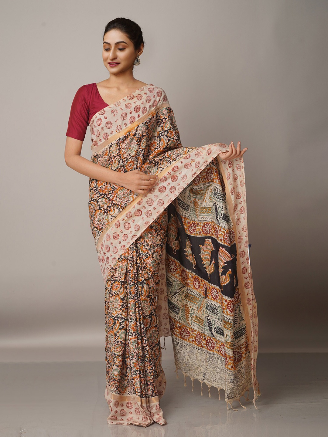 

Unnati Silks Beige & Yellow Kalamkari Pure Silk Block Print Saree