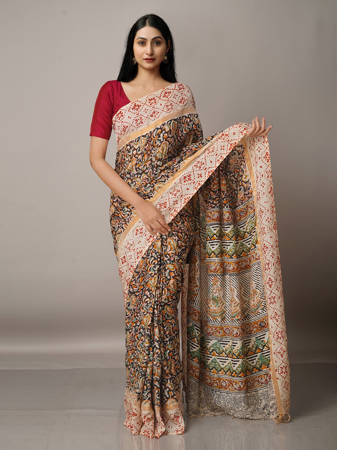 

Unnati Silks Beige & Yellow Kalamkari Pure Silk Block Print Saree