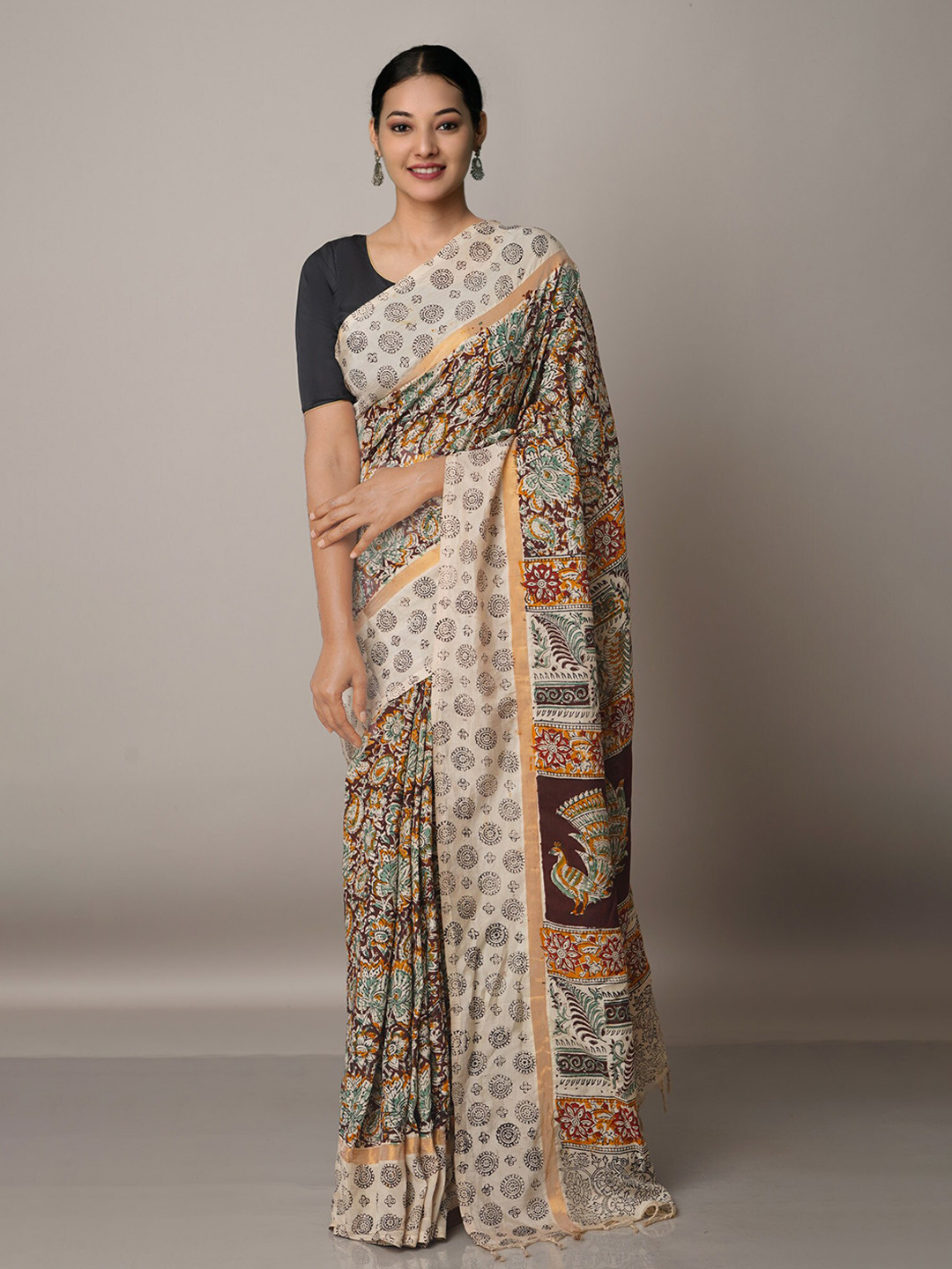 

Unnati Silks Beige & Yellow Kalamkari Pure Silk Block Print Saree