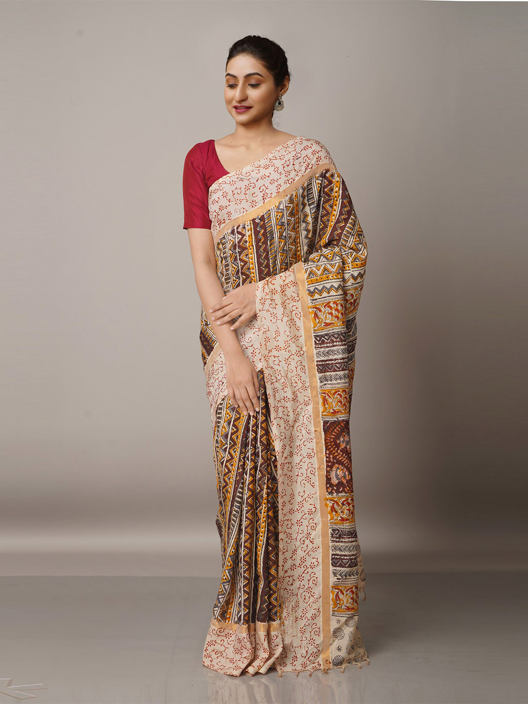 

Unnati Silks Brown & Yellow Kalamkari Pure Silk Block Print Saree