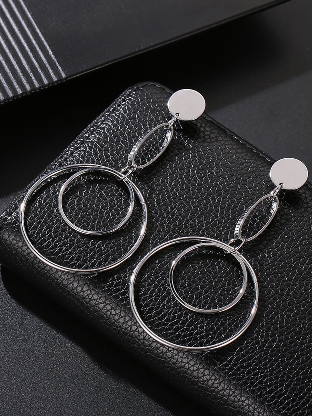 

Designs By Jewels Galaxy Silver-Toned Circular Drop Earrings