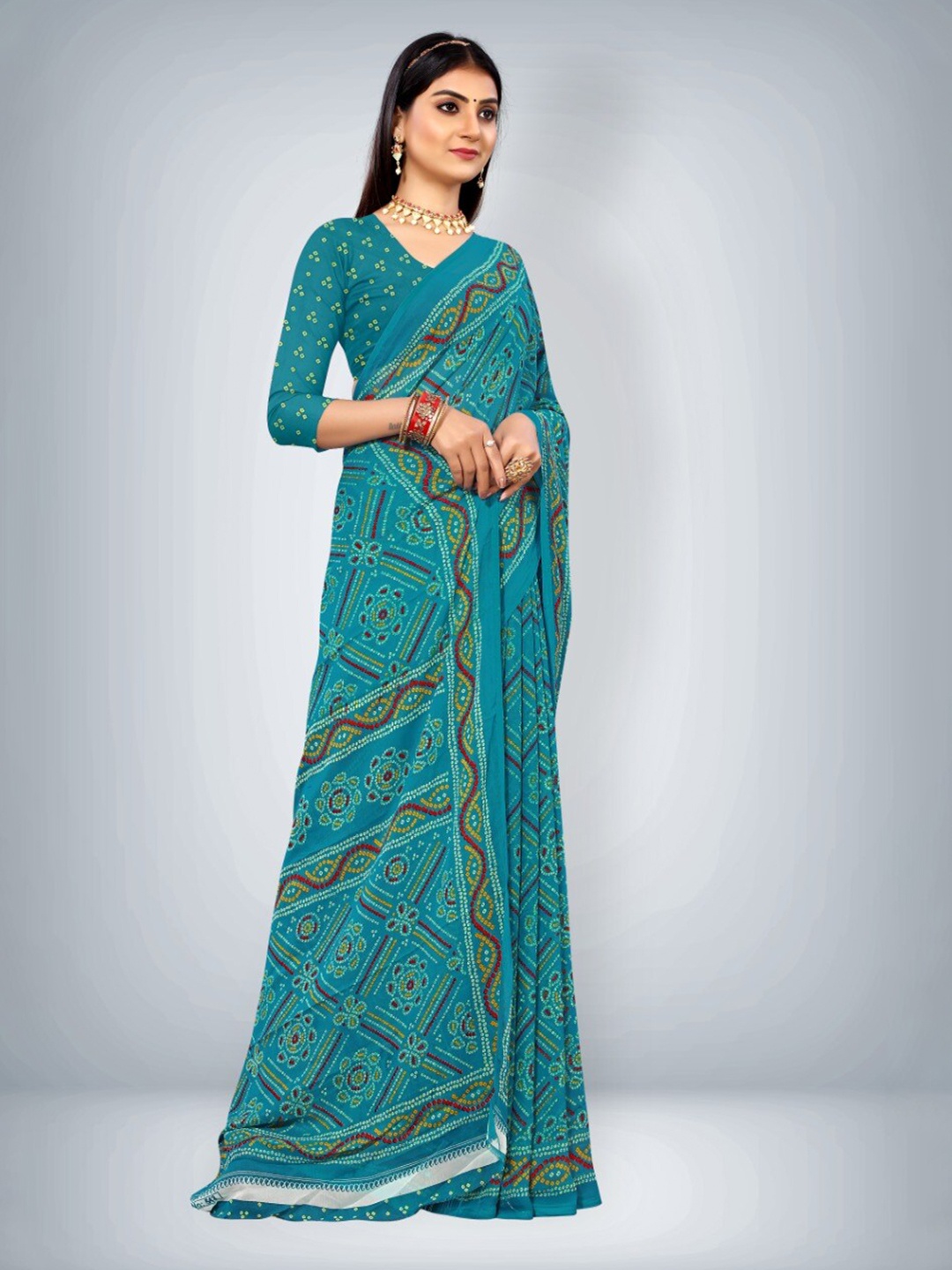 

Abhilasha Teal & Brown Bandhani Pure Georgette Saree