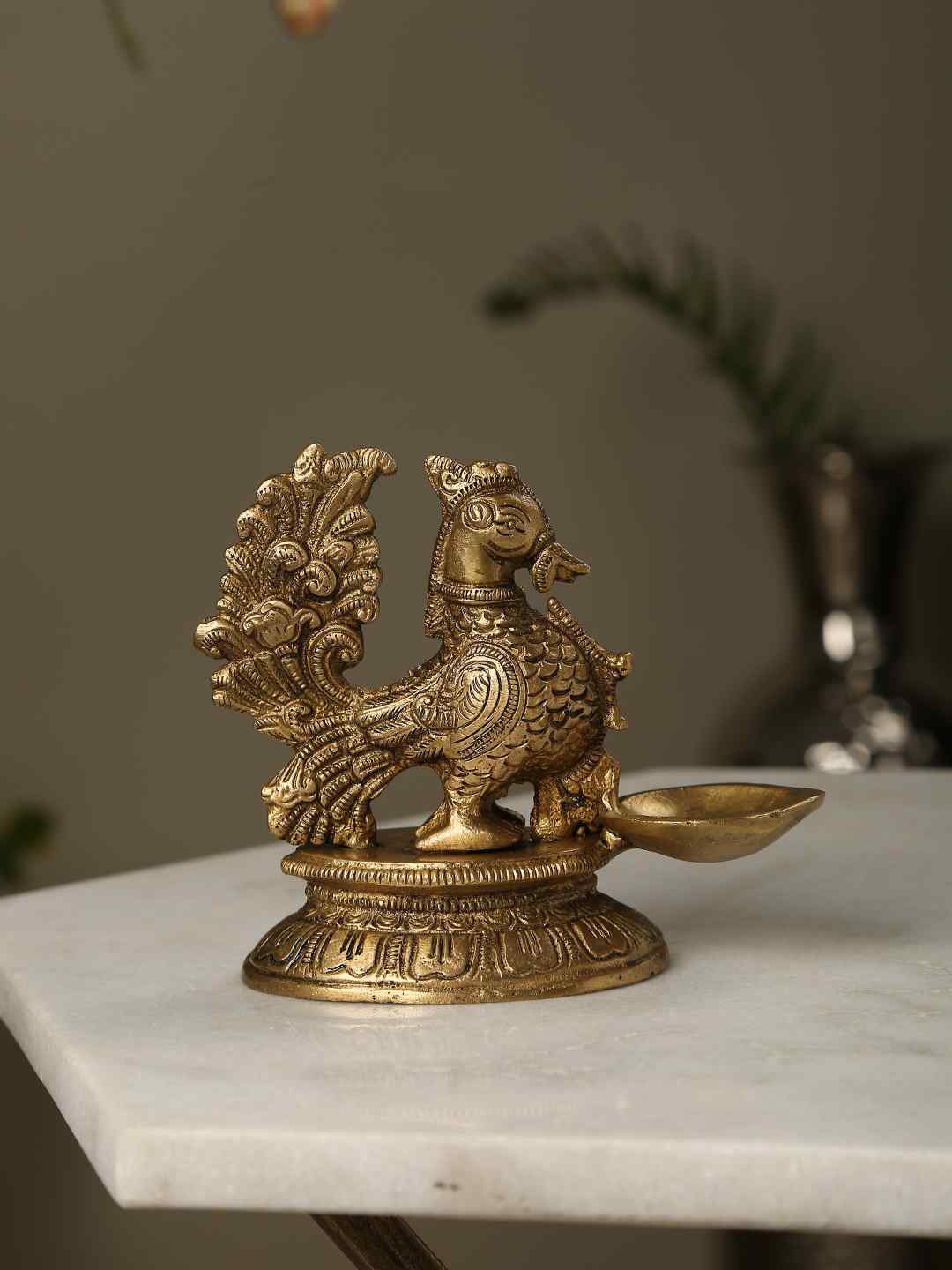 

Amoliconcepts Gold-Toned Peacock Diya Pooja Essentials