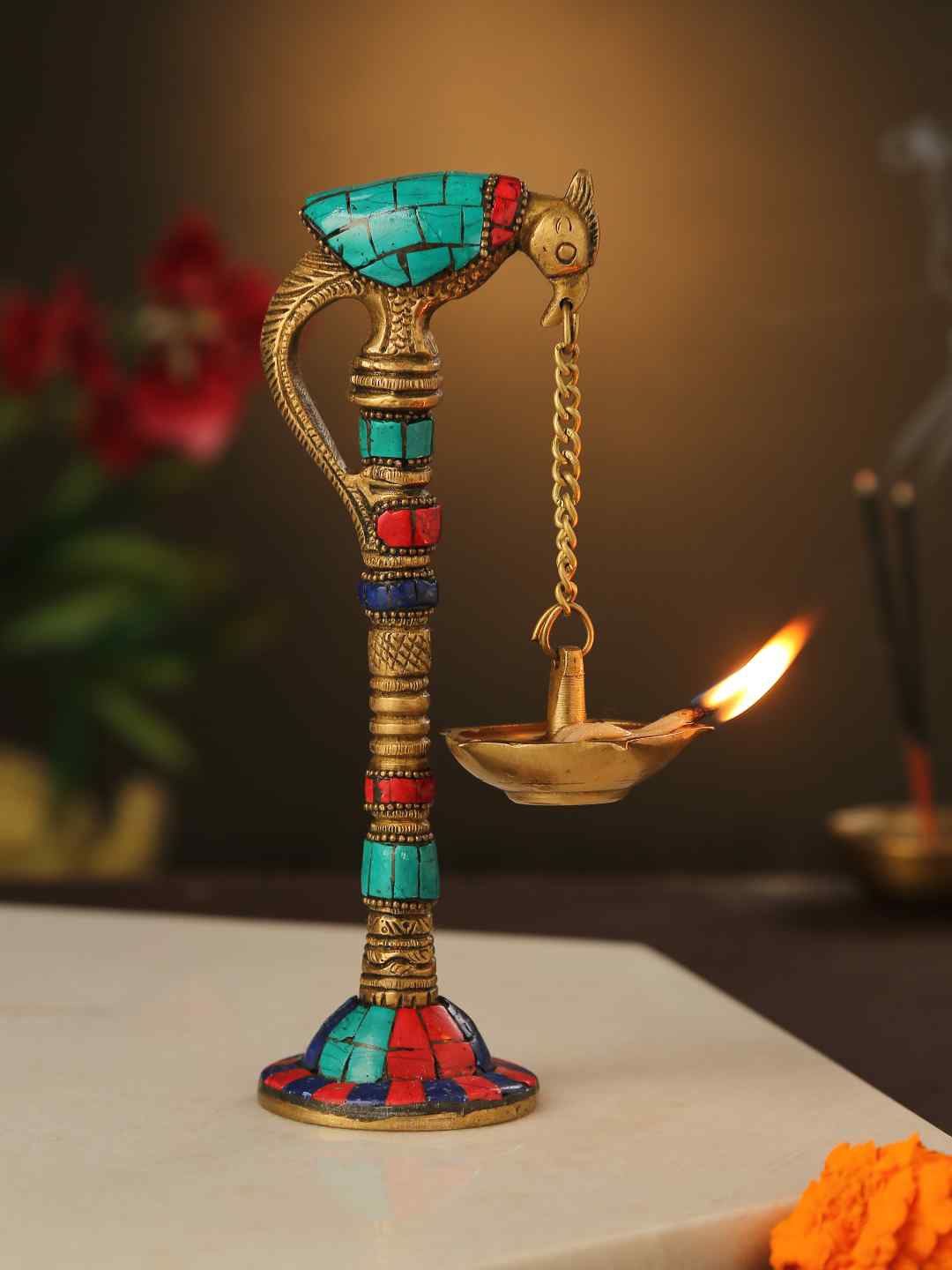 

Amoliconcepts Gold-Toned & Turquoise Blue Parrot Diya Pooja Essentials