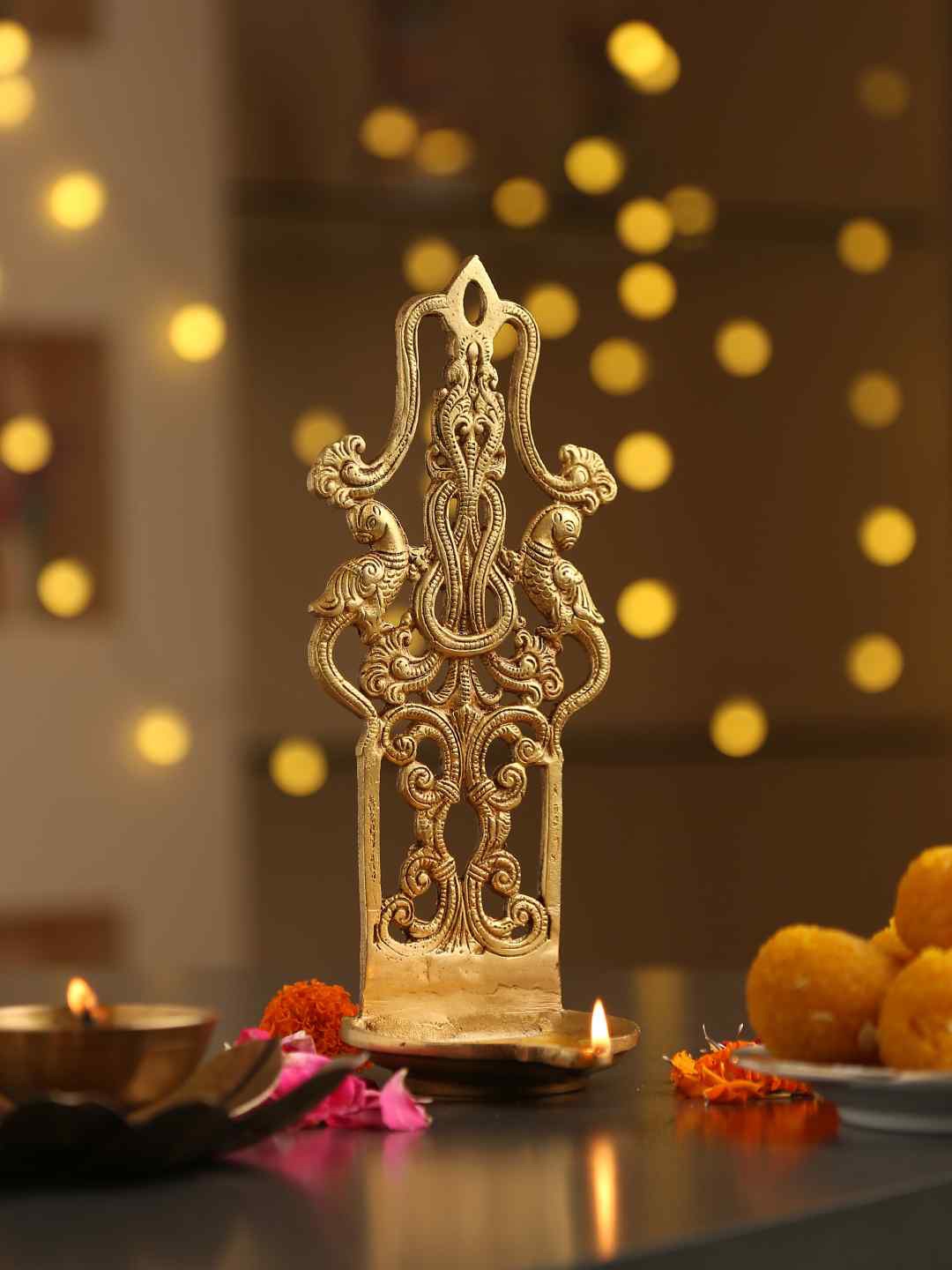 

Amoliconcepts Gold-Toned Wall Diya Pooja Essentials