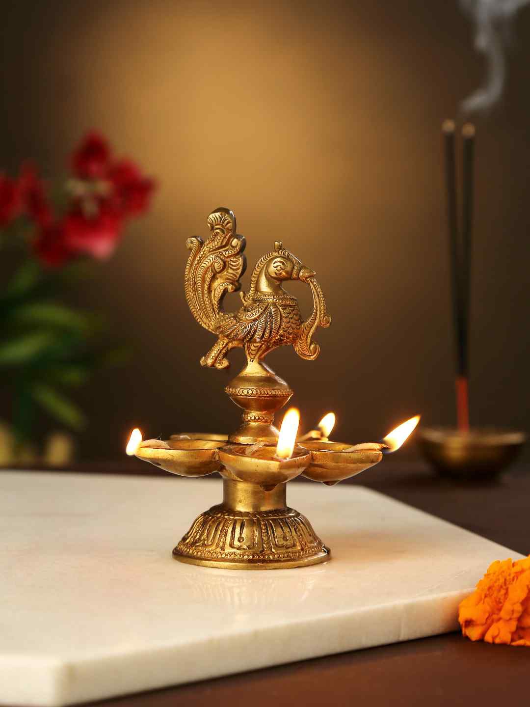 

Amoliconcepts Gold-Toned Peacock Diya Pooja Essentials