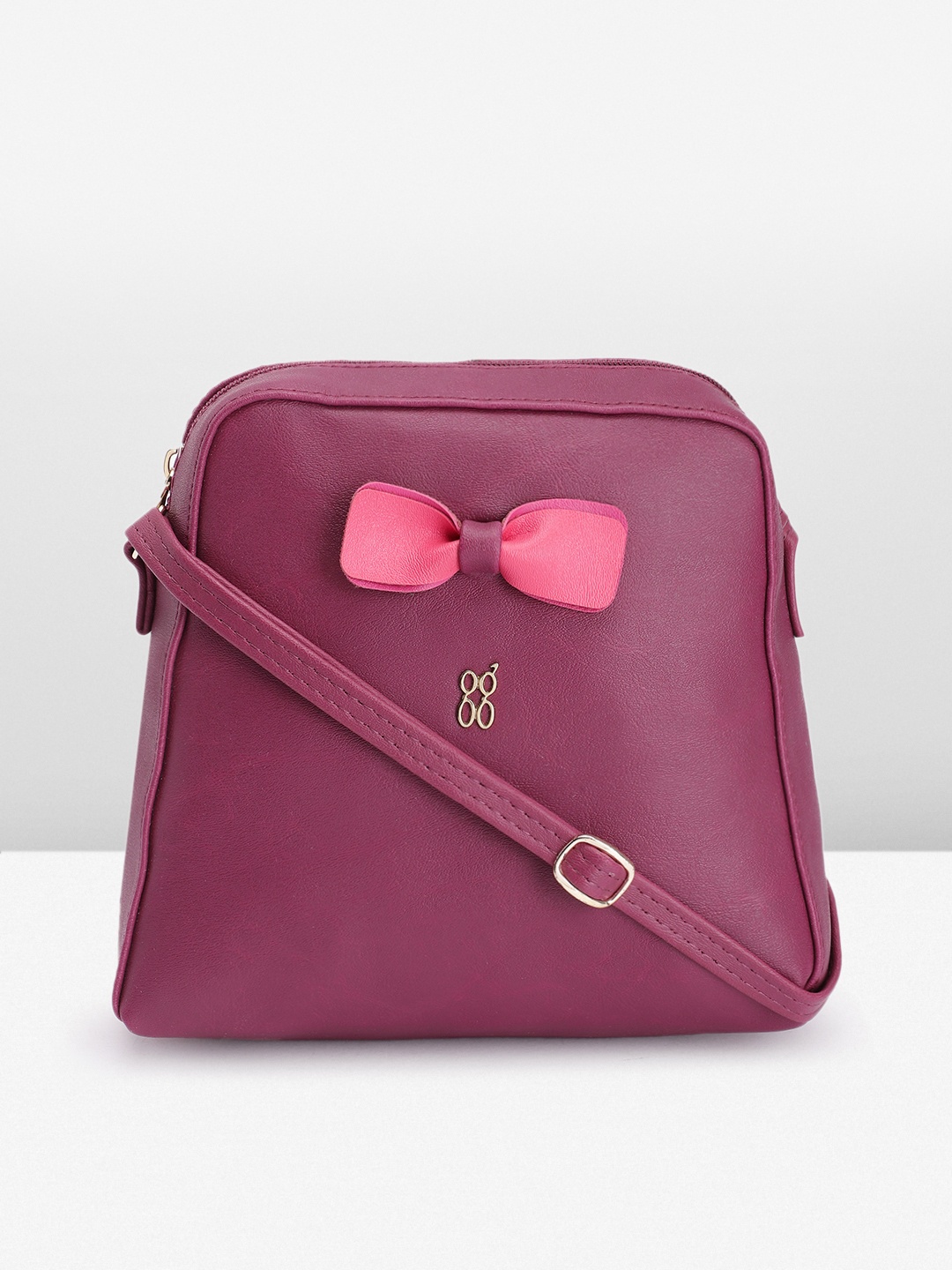 

Baggit Women Solid Sling Bag, Purple