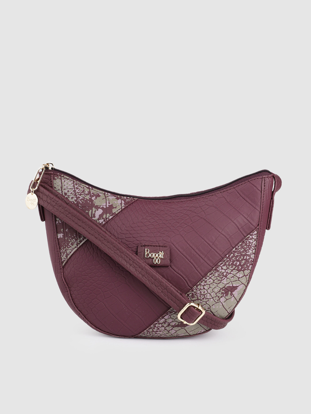 

Baggit Women Purple Textured Structured Sling Bag