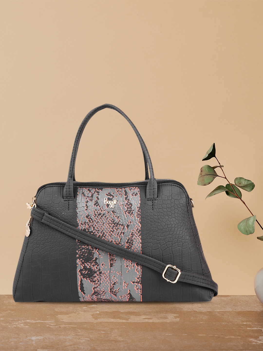 

Baggit Black Textured Handheld Bag