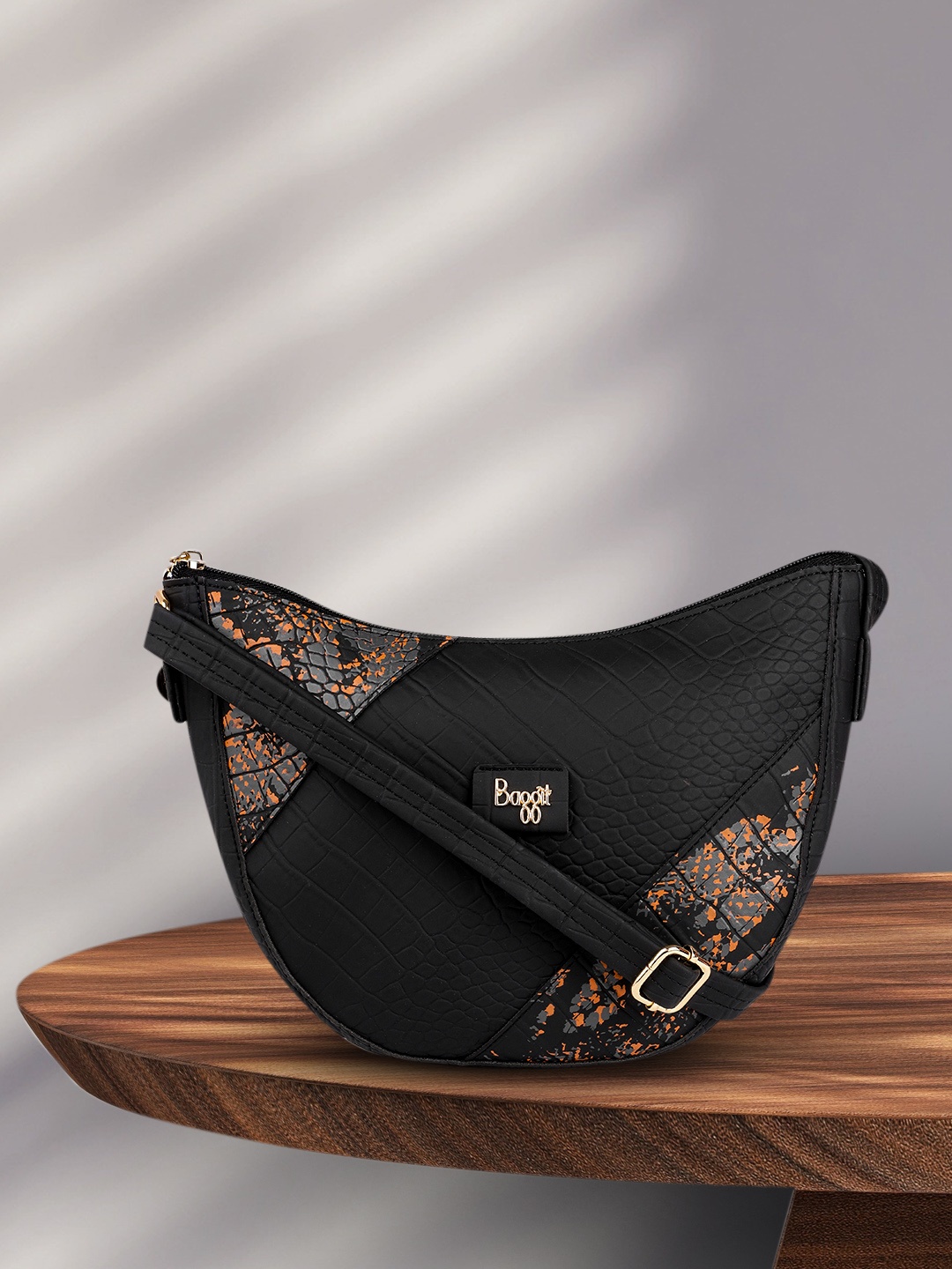 

Baggit Black Textured Sling Bag