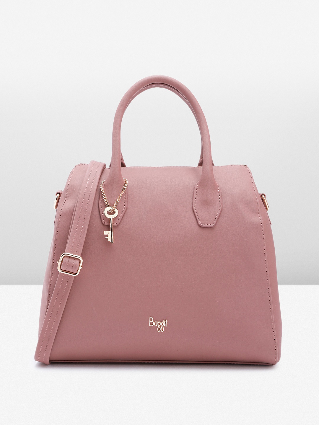 

Baggit Solid PU Structured Duffle Handheld Bag With A Key & Chain Detail, Mauve
