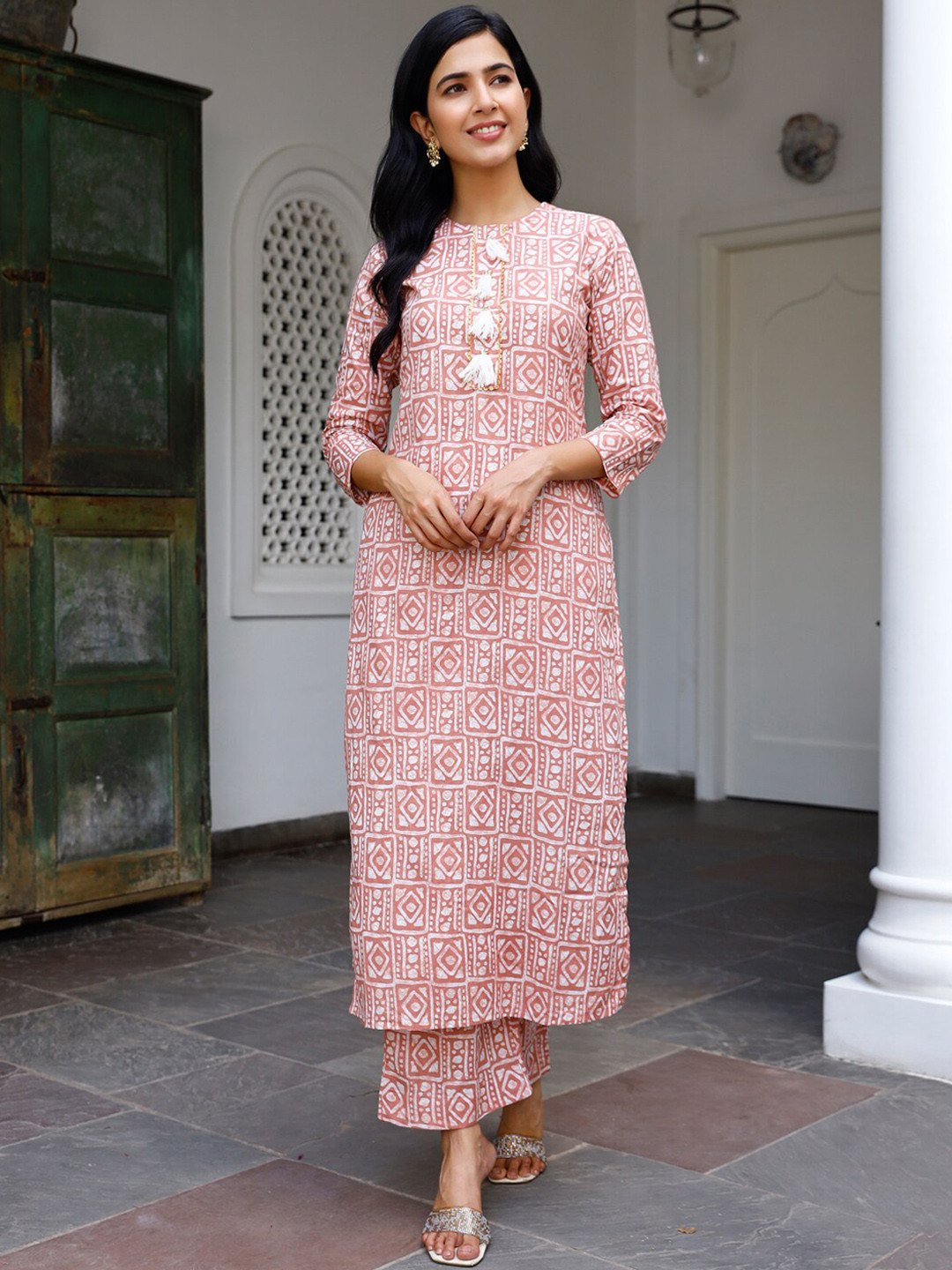 

Ambraee Women Peach-Coloured Printed Kurta with Trousers