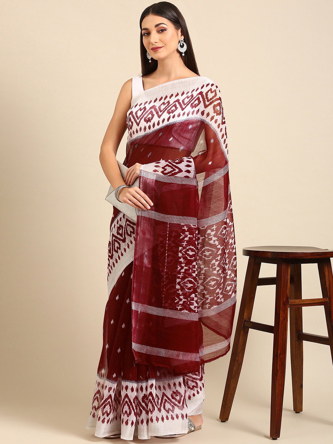 

Anouk Maroon Ethnic Motifs Saree