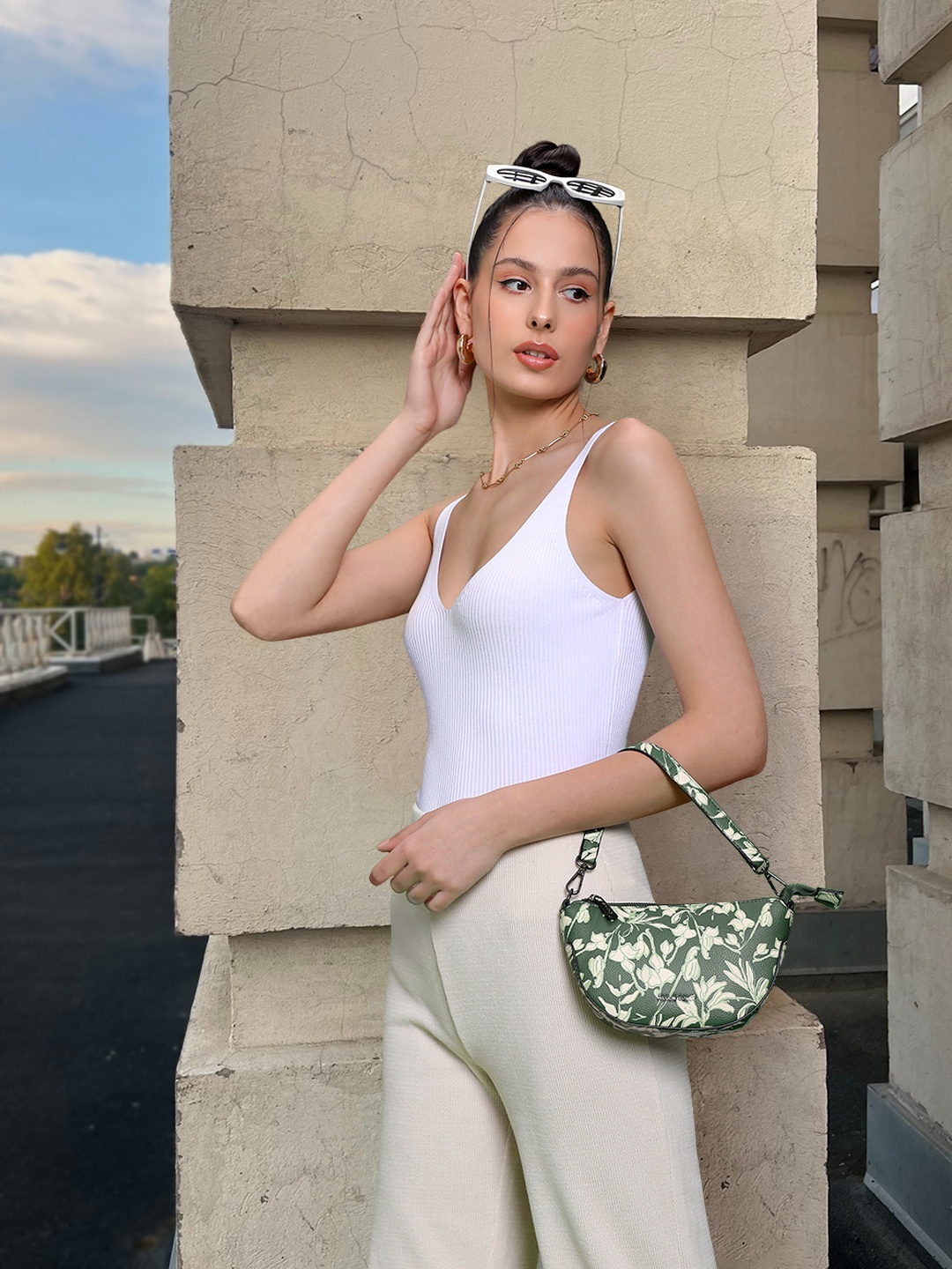 

Allen Solly Women Green Floral Print Structured Sling Bag