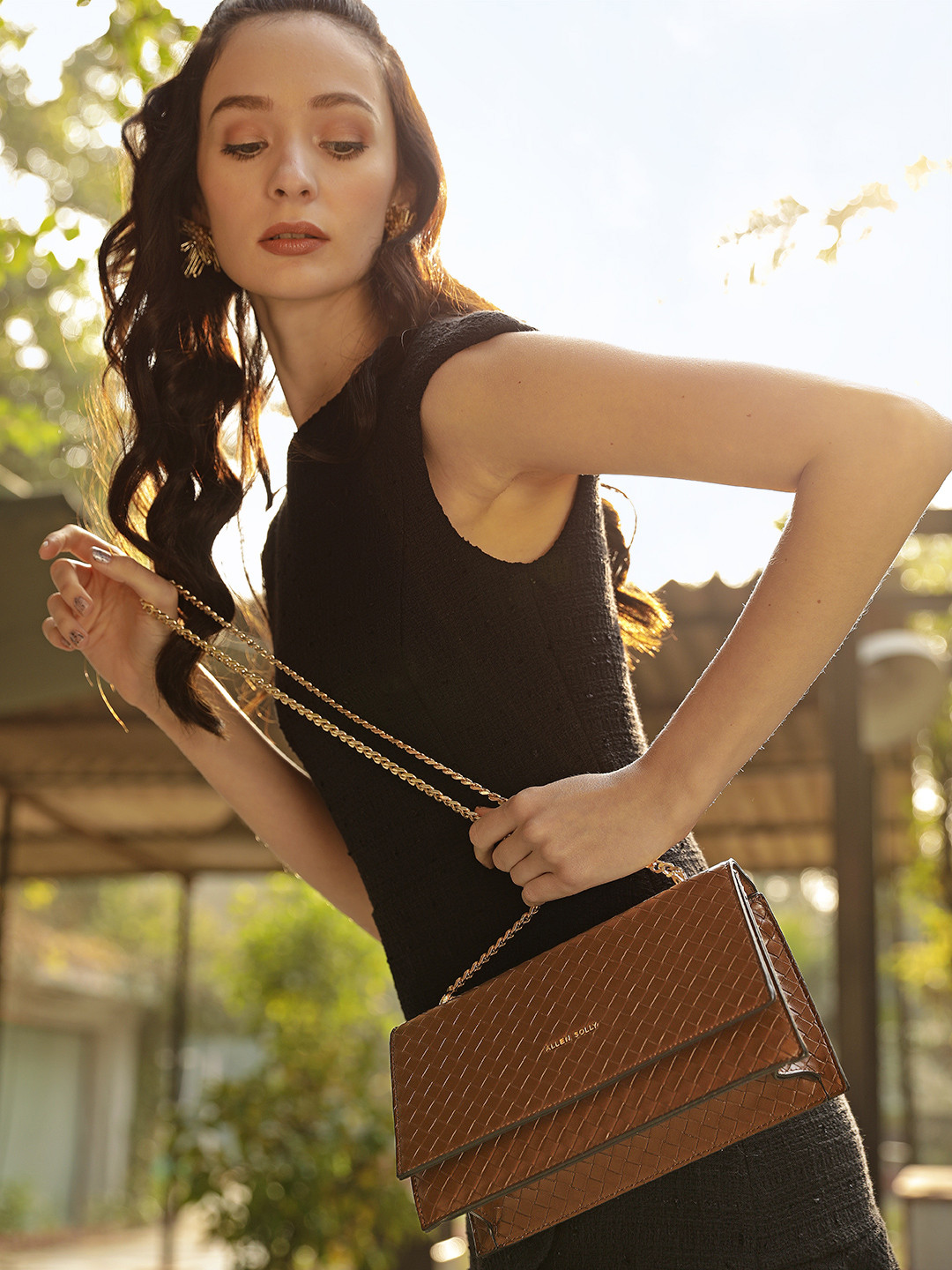 

Allen Solly Brown Woven Design Structured Sling Bag