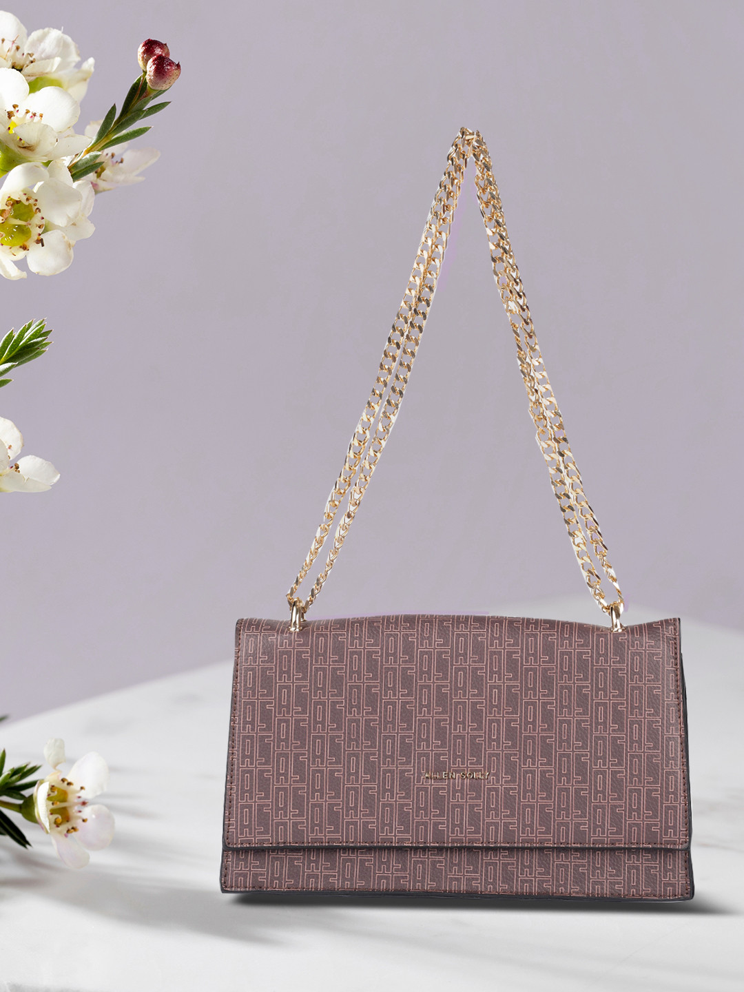 

Allen Solly Mauve Brand Logo Printed Structured Sling Bag