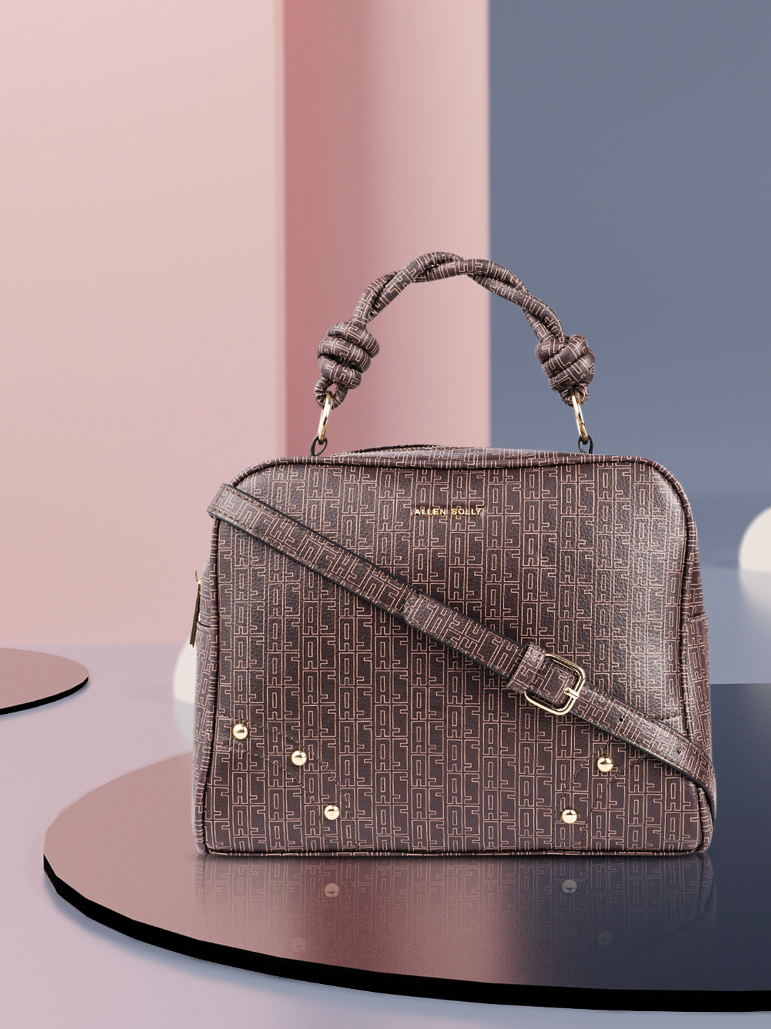 

Allen Solly Brown Printed Handheld Bag