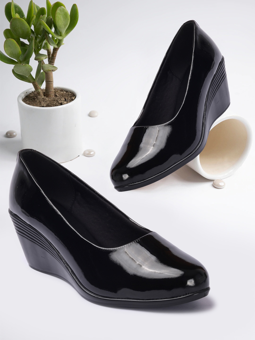 

Bella Toes Black Work Wedge Pumps