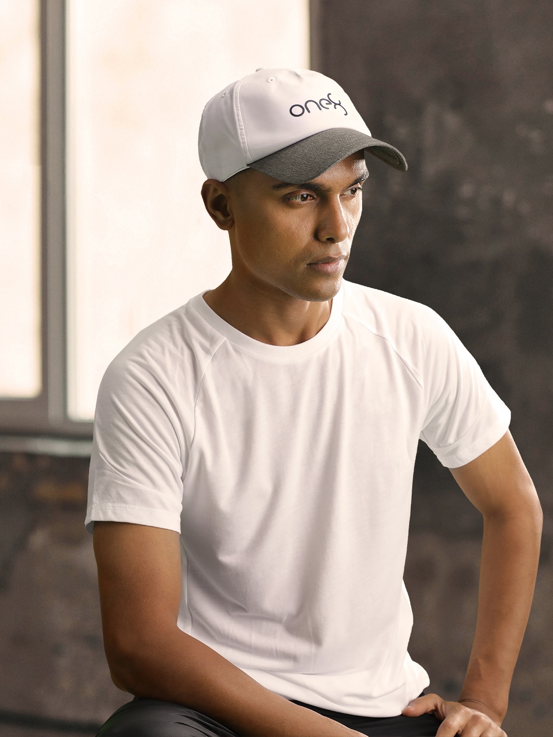 

Puma x One 8 Virat Kohli Unisex White & Grey Colourblocked Snapback Cap