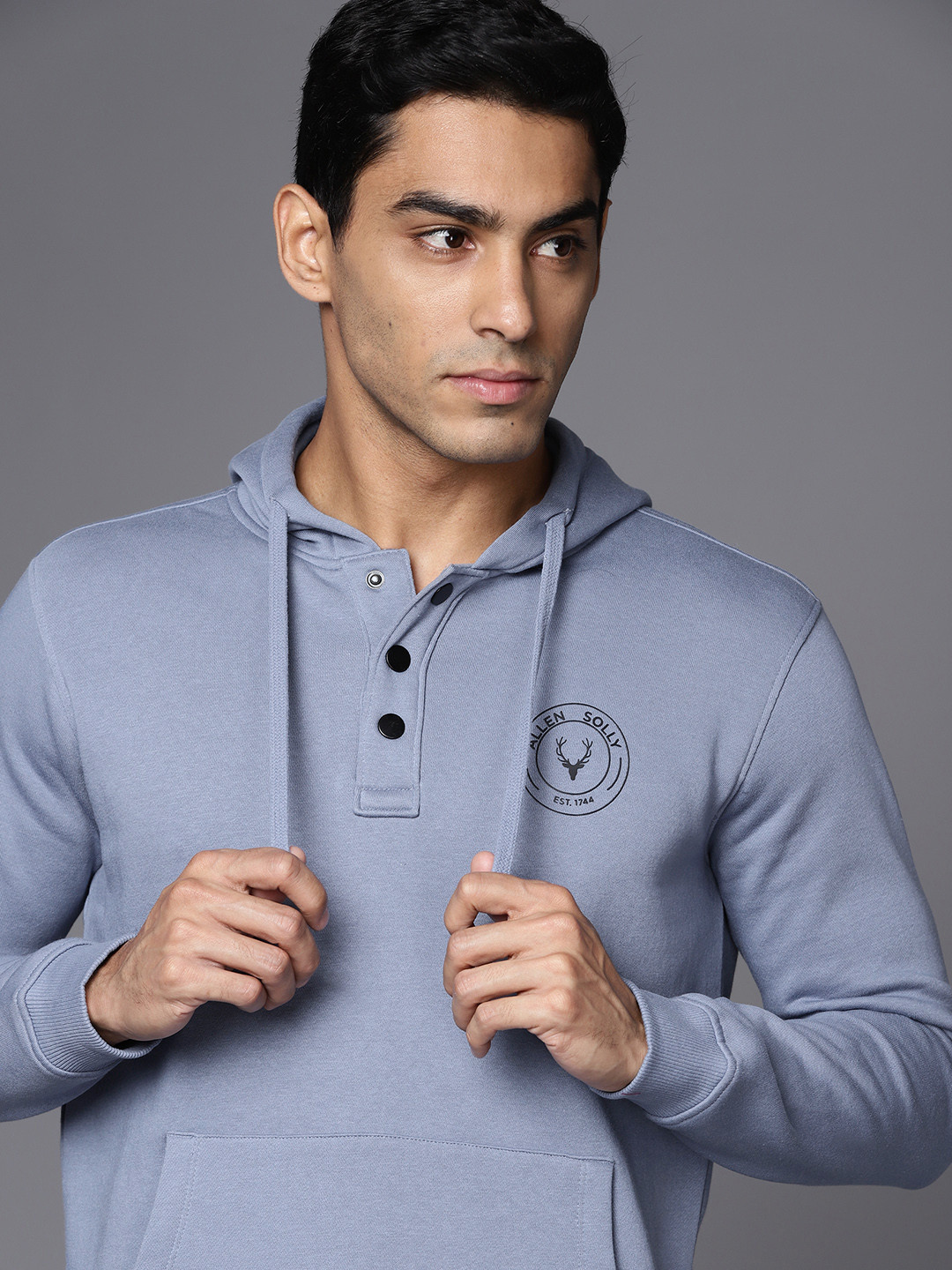 

Allen Solly Men Blue Solid Hooded Sweatshirt