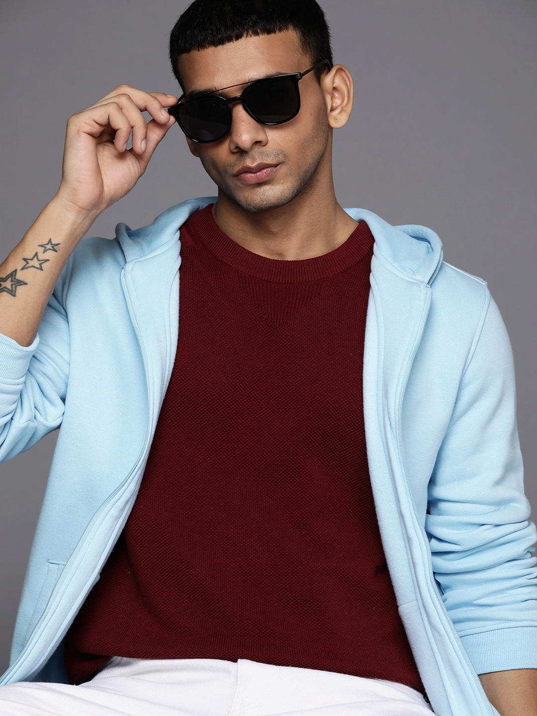 

Allen Solly Men Blue Solid Hooded Sweatshirt