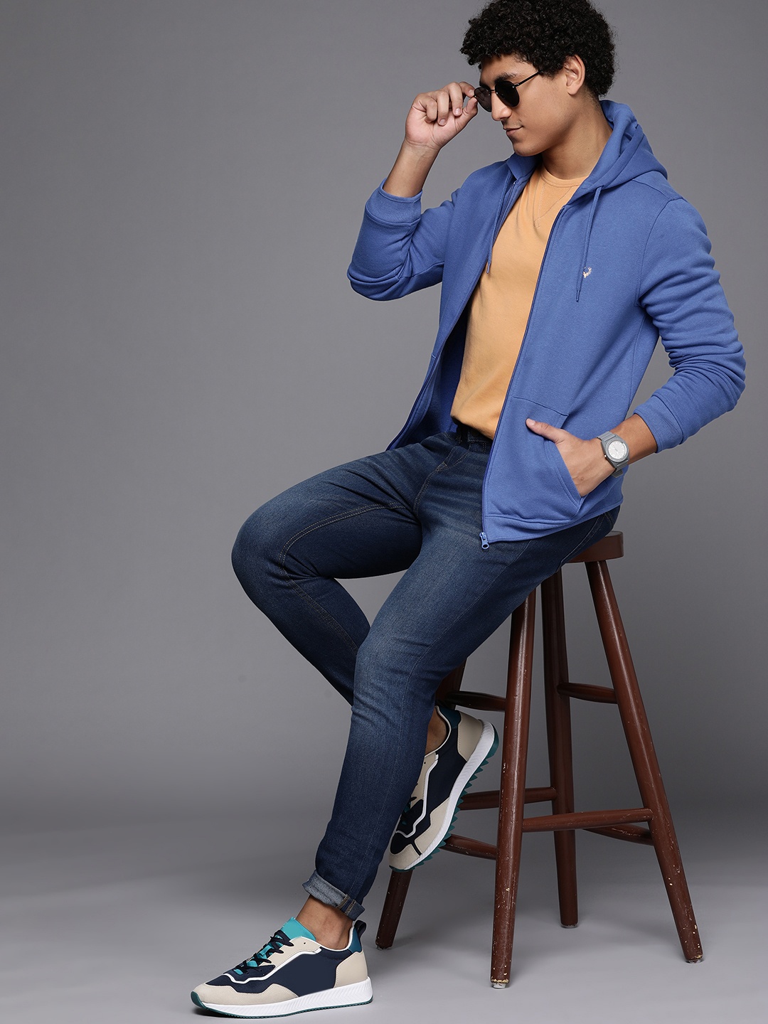 

Allen Solly Men Blue Solid Hooded Sweatshirt