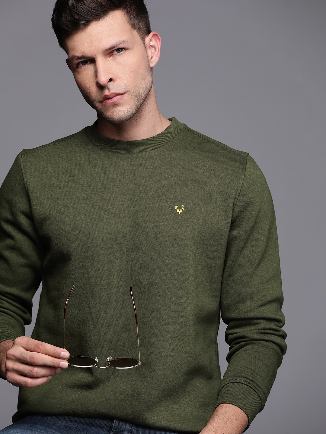 

Allen Solly Men Olive Green Solid Sweatshirt