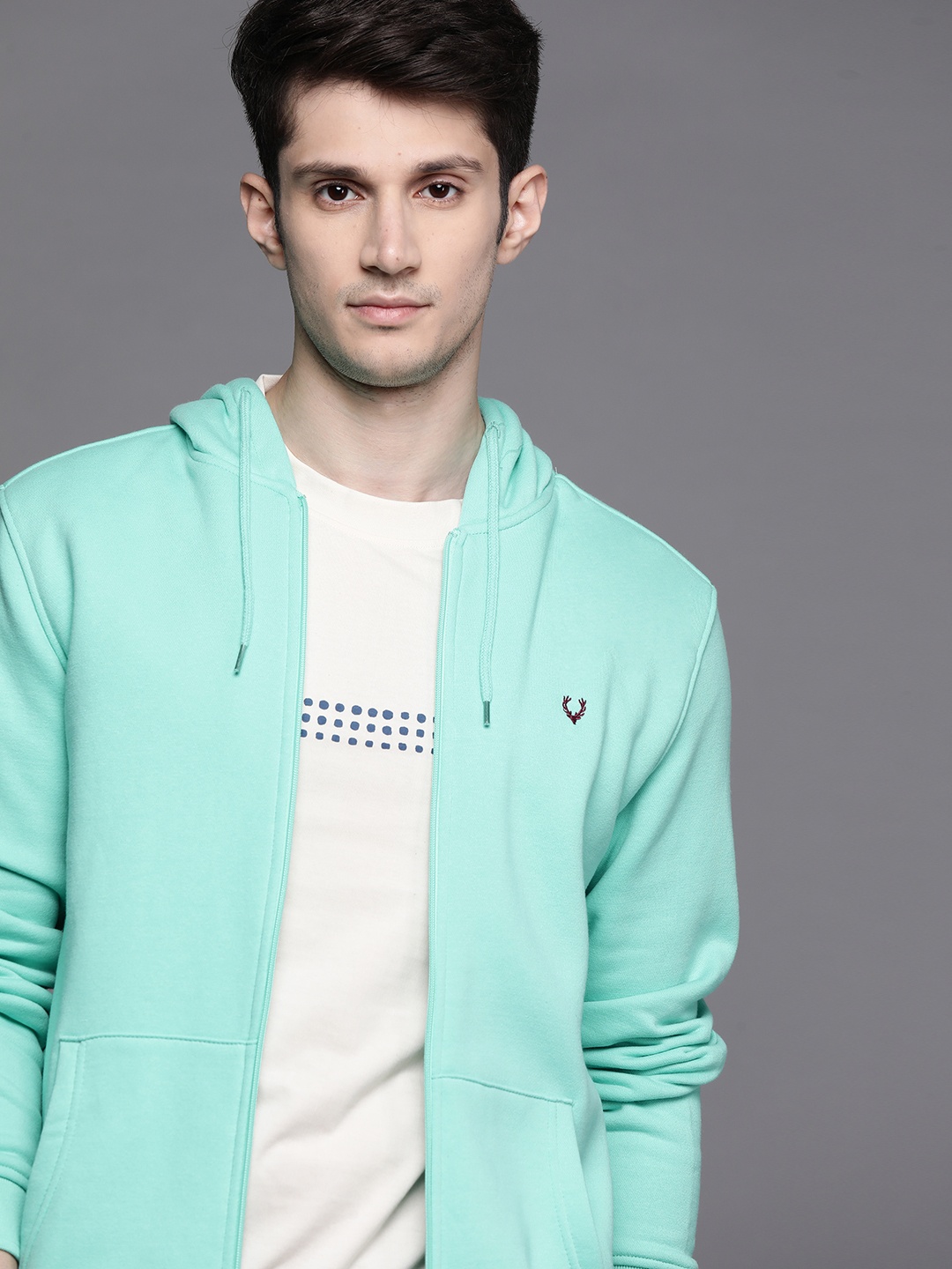 

Allen Solly Men Green Solid Hooded Sweatshirt