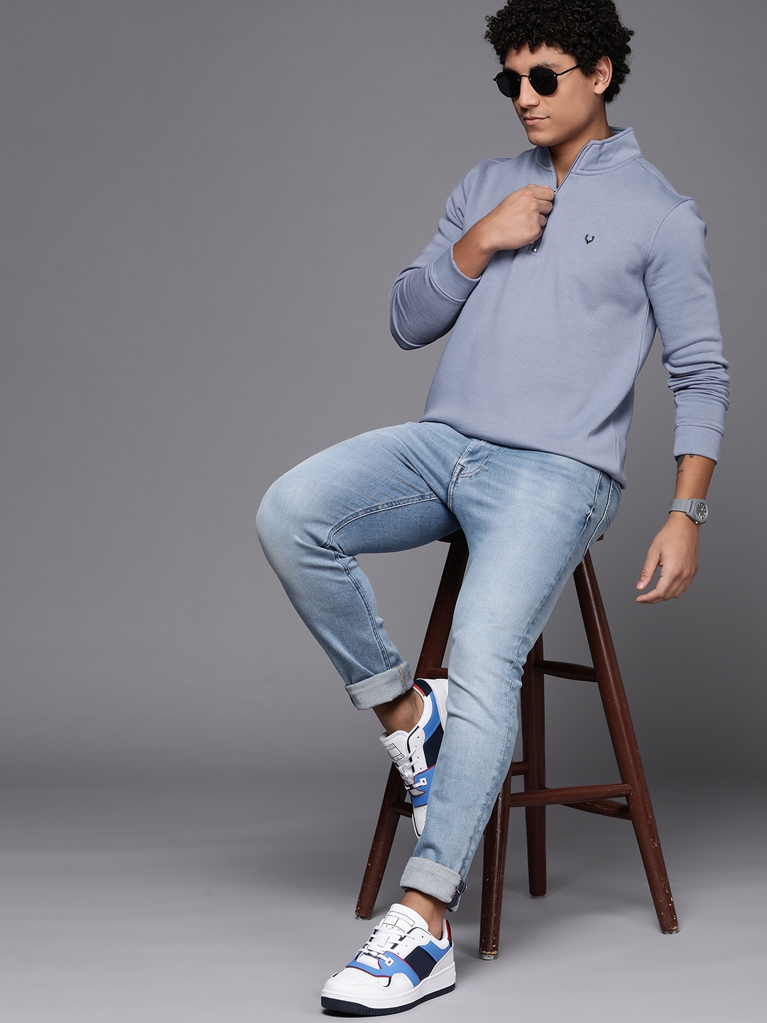

Allen Solly Men Blue Solid Mock Collar Half Zipper Sweatshirt