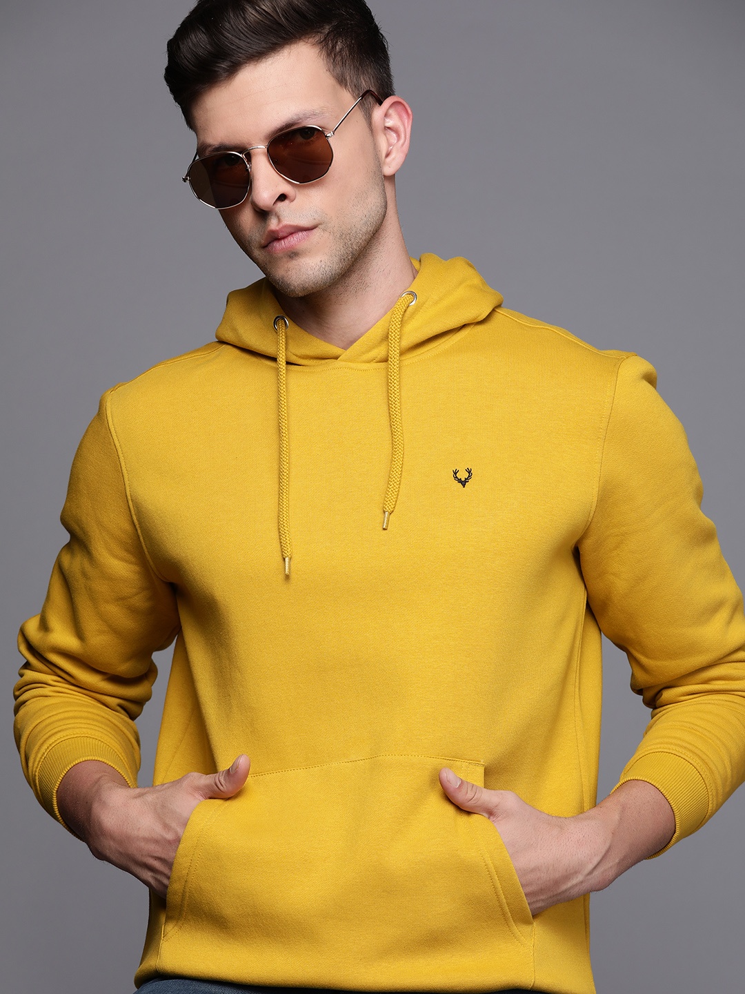 

Allen Solly Men Mustard Yellow Hooded Solid Sweatshirt