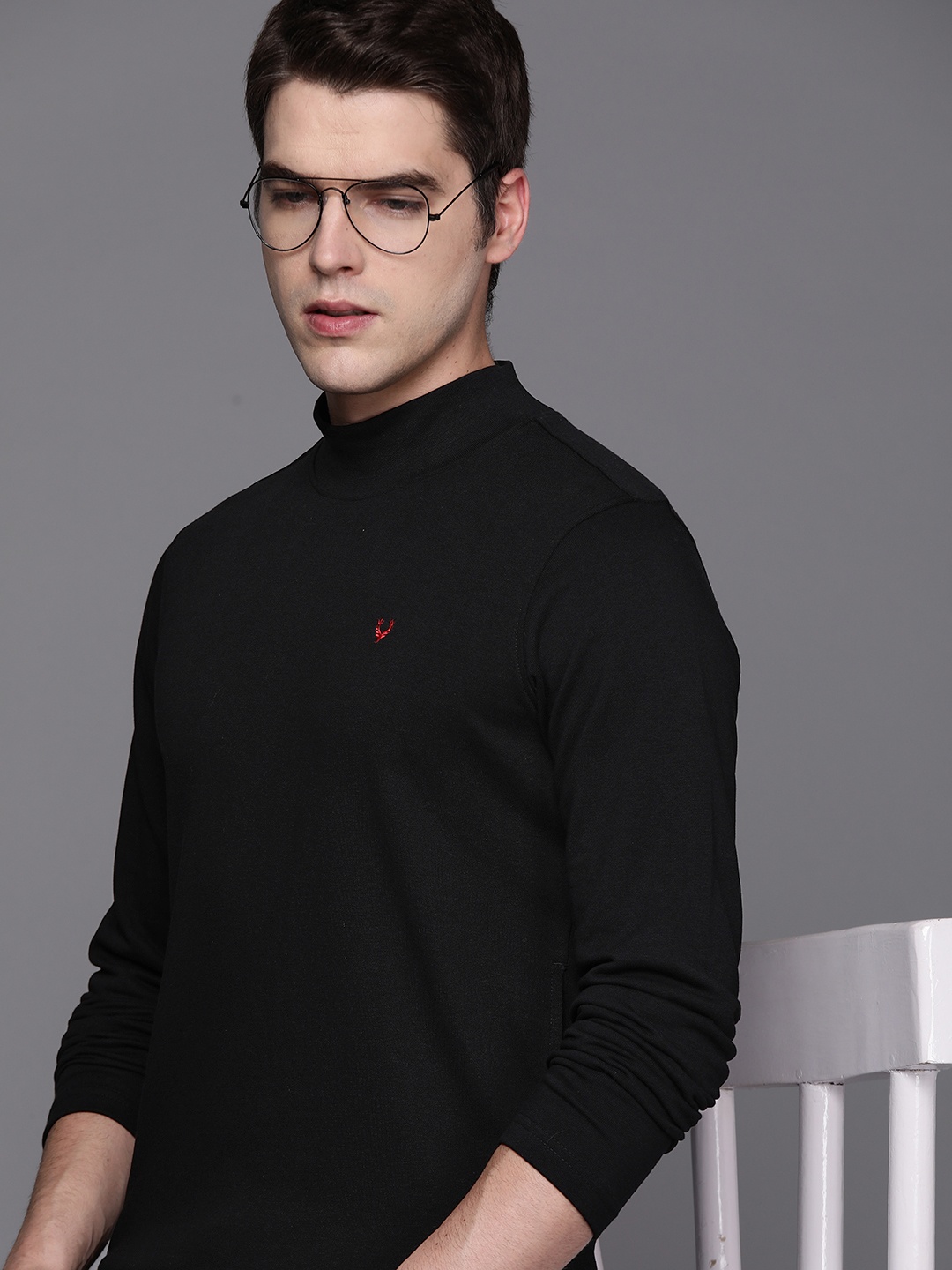 

Allen Solly Men Black Solid Turtle Neck Sweatshirt