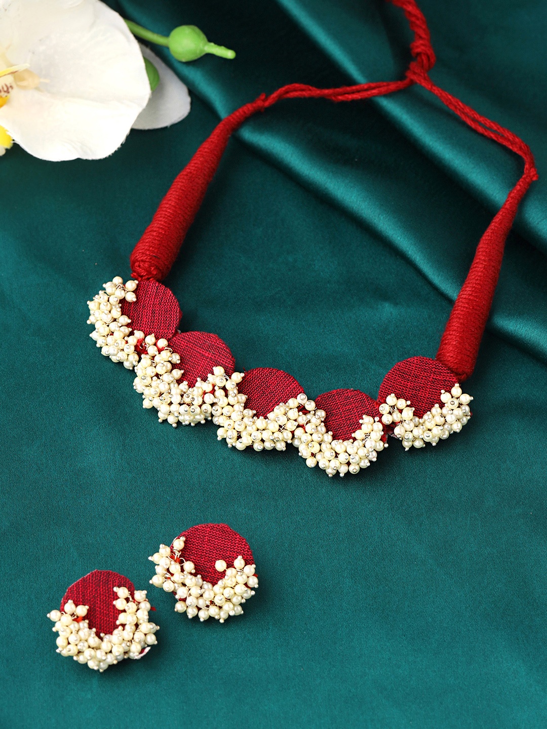 

Yellow Chimes Maroon & White Pearl Studded Jewellery Set