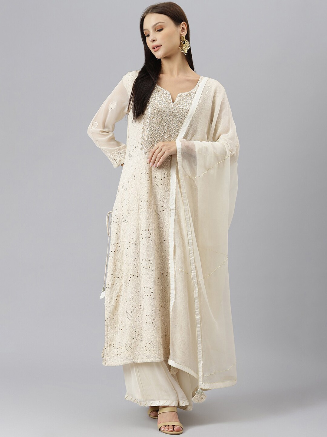 

Divena Women White Ethnic Motifs Embroidered Zardozi Silk Georgette Kurta with Sharara & With Dupatta