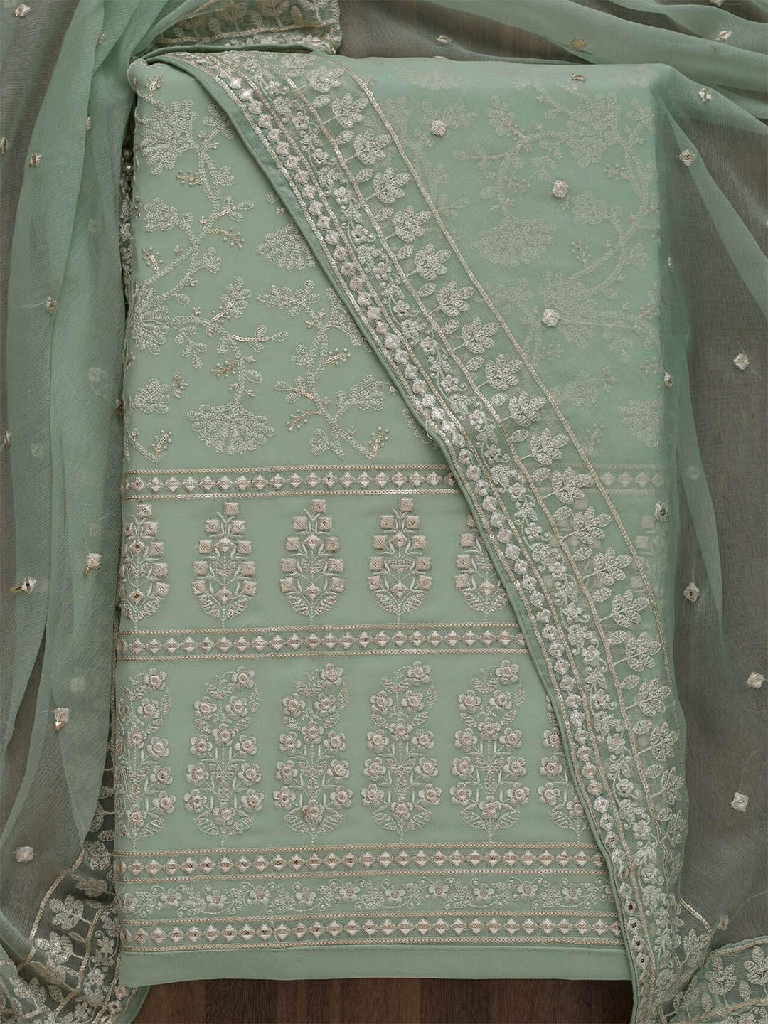 

Koskii Women Green & Silver-Toned Embroidered Unstitched Dress Material