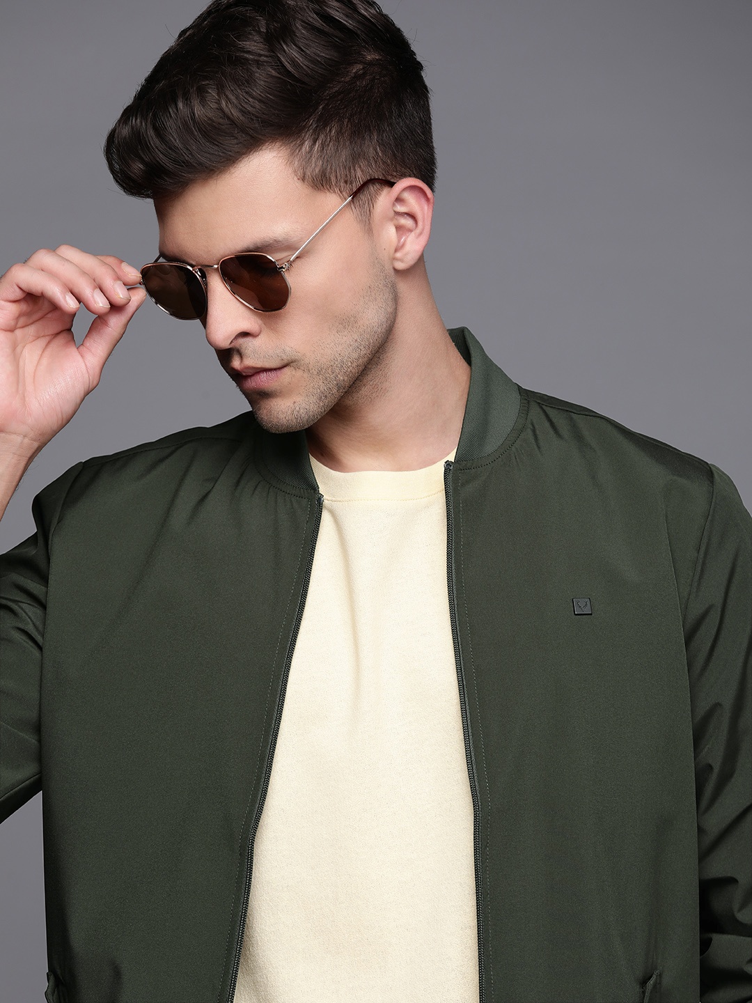 

Allen Solly Men Olive Green Solid Bomber Jacket