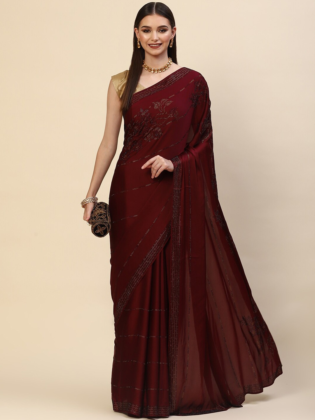 

Meena Bazaar Burgundy & Gold-Toned Embellished Satin Saree