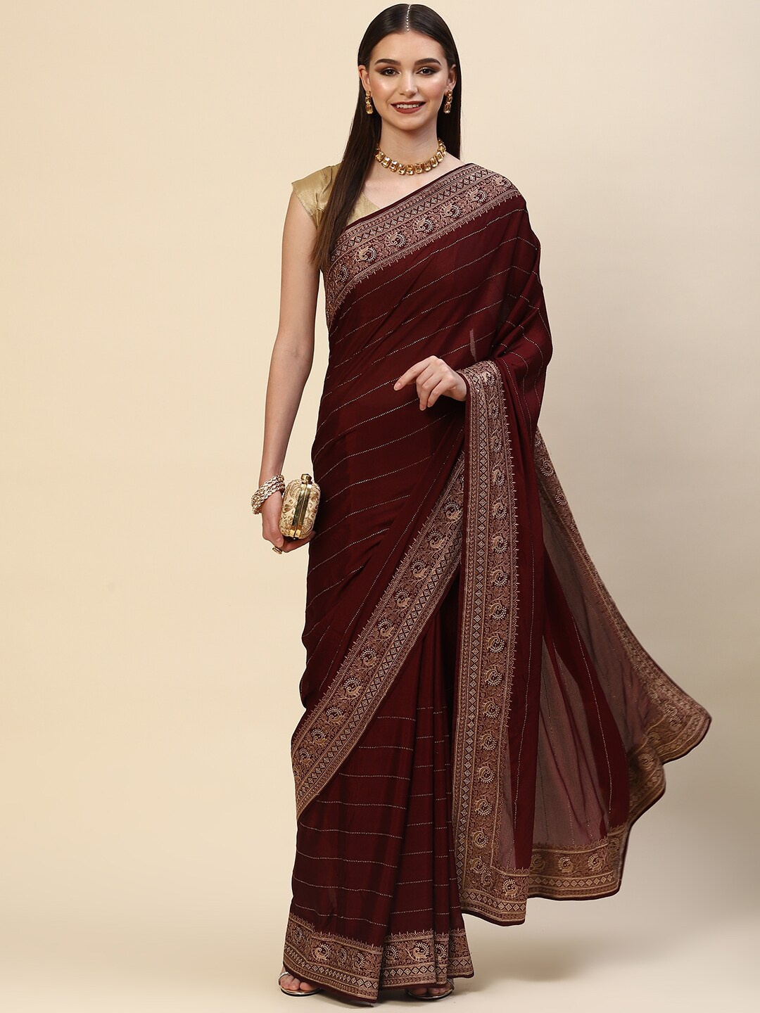 

Meena Bazaar Burgundy & Gold-Toned Embellished Georgette Saree