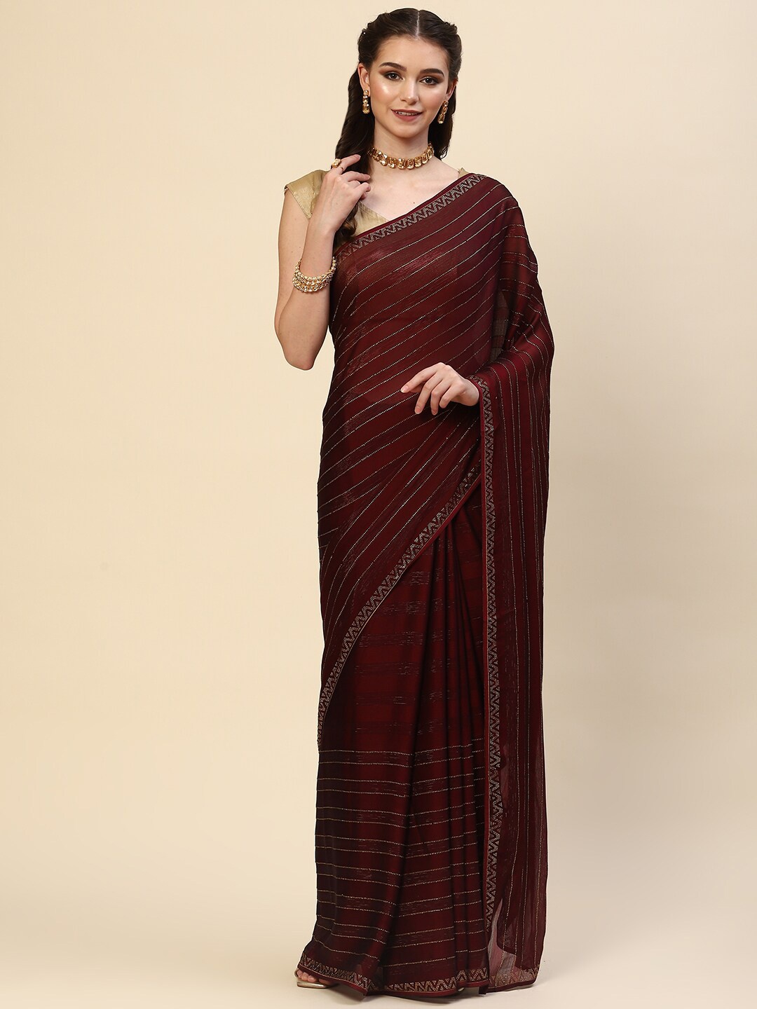 

Meena Bazaar Burgundy Embellished Saree