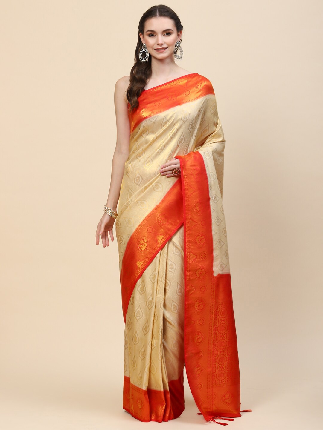 

Meena Bazaar Beige & Orange Ethnic Motifs Zari Art Silk Saree
