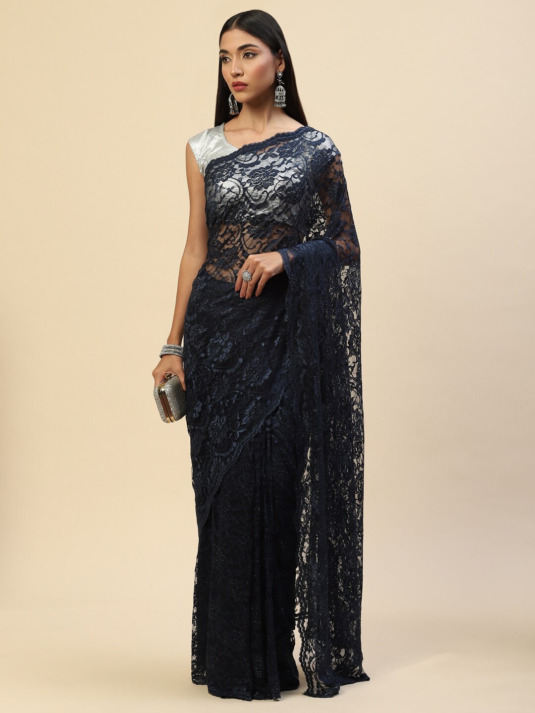 

Meena Bazaar Navy Blue Embellished Embroidered Net Saree