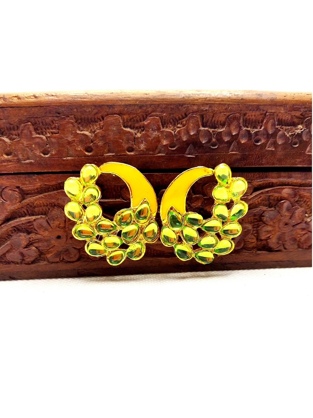 

Kshitij Jewels Mustard Gold-Plated Peacock Shaped Studs Earrings