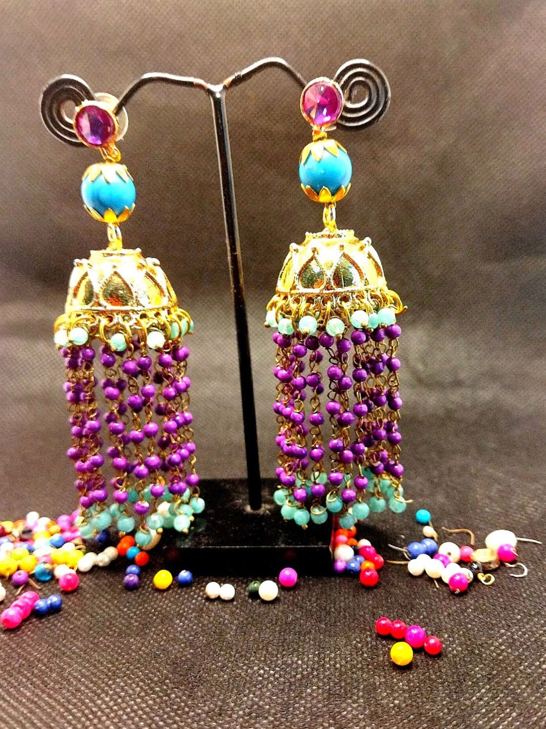 

Kshitij Jewels Fuchsia & Gold Plated Circular Drop Earrings