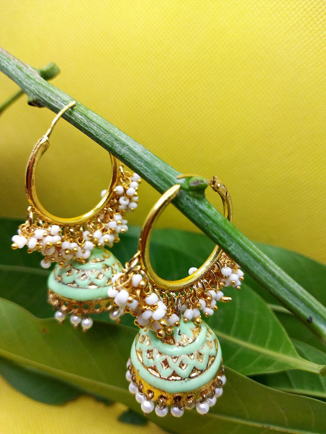 

Kshitij Jewels Women Gold-Toned & Lime Green Circular Jhumkas Earrings